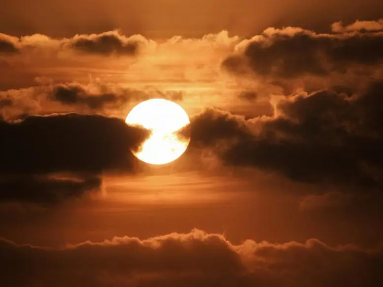 Dark Clouds Over Sun