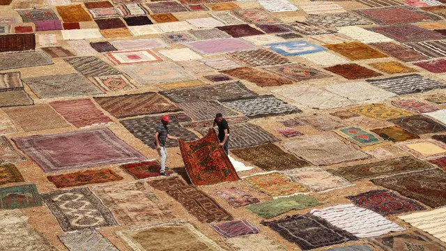 Hand-woven carpets cover the fields near Antalya