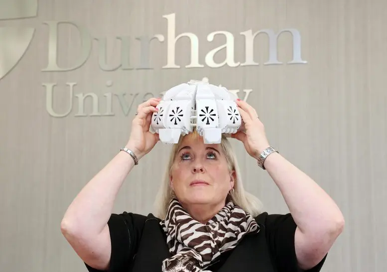 Tracy Sloan With Infrared Light Therapy Helmet