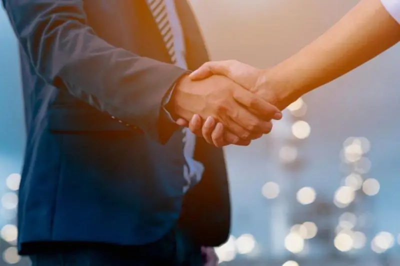 A handshake transfers more bacteria than a kiss