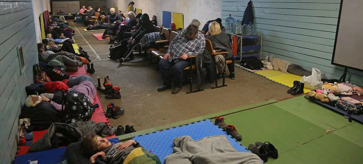 On 25 February 2022, people shelter in a school during ongoing military operations in Kyiv, Ukraine. On 25 February 2022, people shelter in a school during ongoing military operations in Kyiv, Ukraine.
