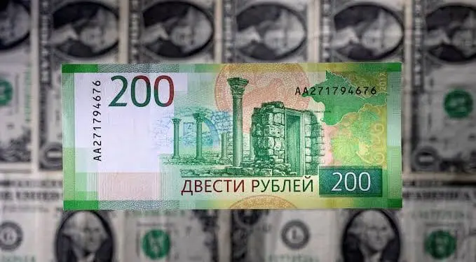 Ruble plummets as central bank loosens some capital controls