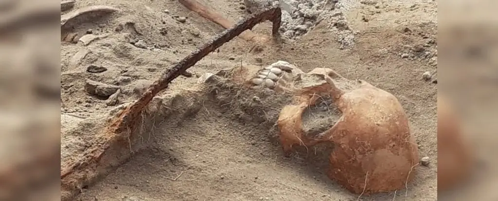Archaeologists have discovered a “female vampire” with a sickle around her neck and a padlock on her leg in Poland