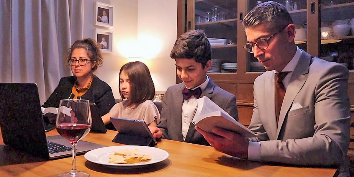 A family in Belgium attends a virtual observance of the 2021 Memorial of Christ’s death