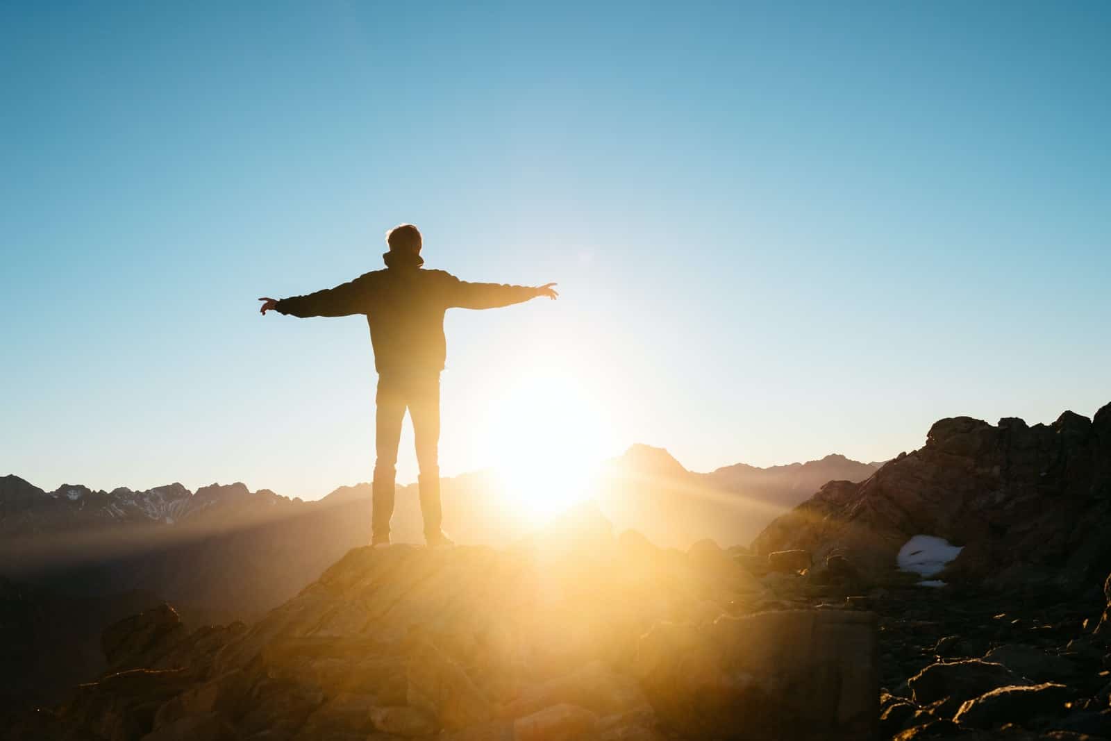 faith - person standing on hill