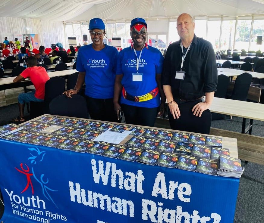 Youth for Human Rights Education booth AIDO network issues declaration of Mombasa on Human Rights